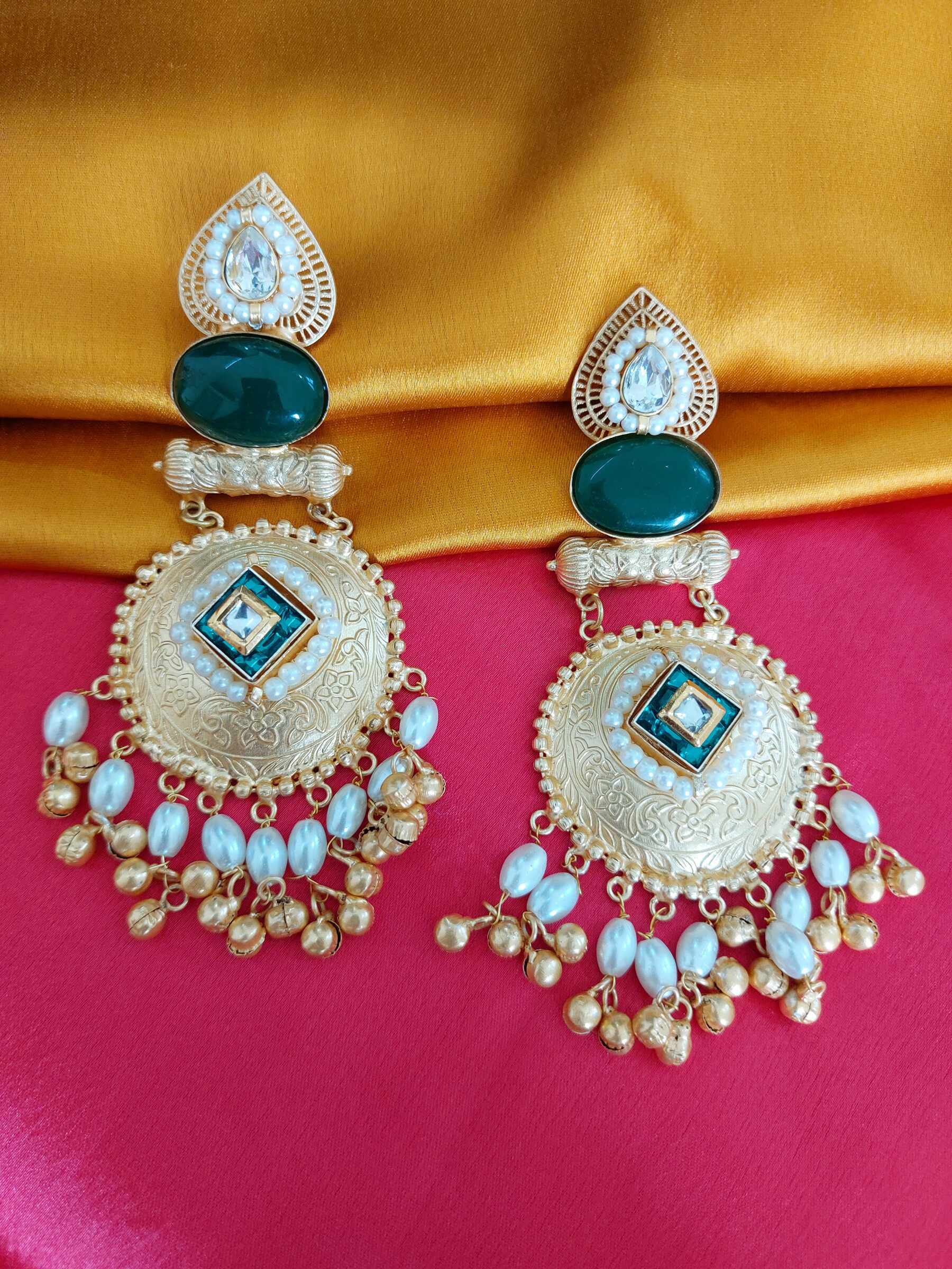 Anika Green stone Kundan Embellished Hand Carved Pearl Golden Replica Earrings