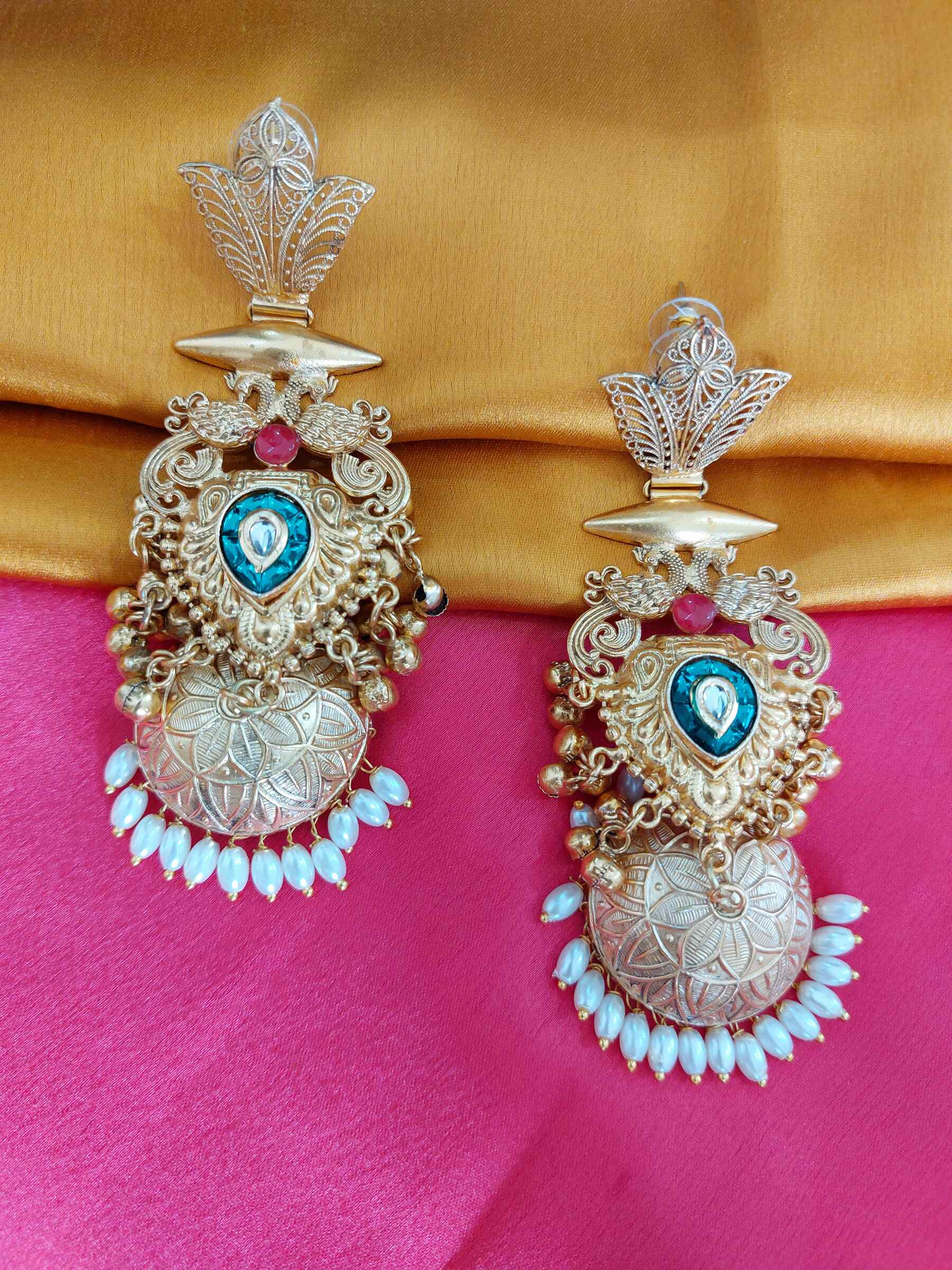 Aria Kundan Embellished Hand Carved Jhumka Pearl Golden Replica Earrings
