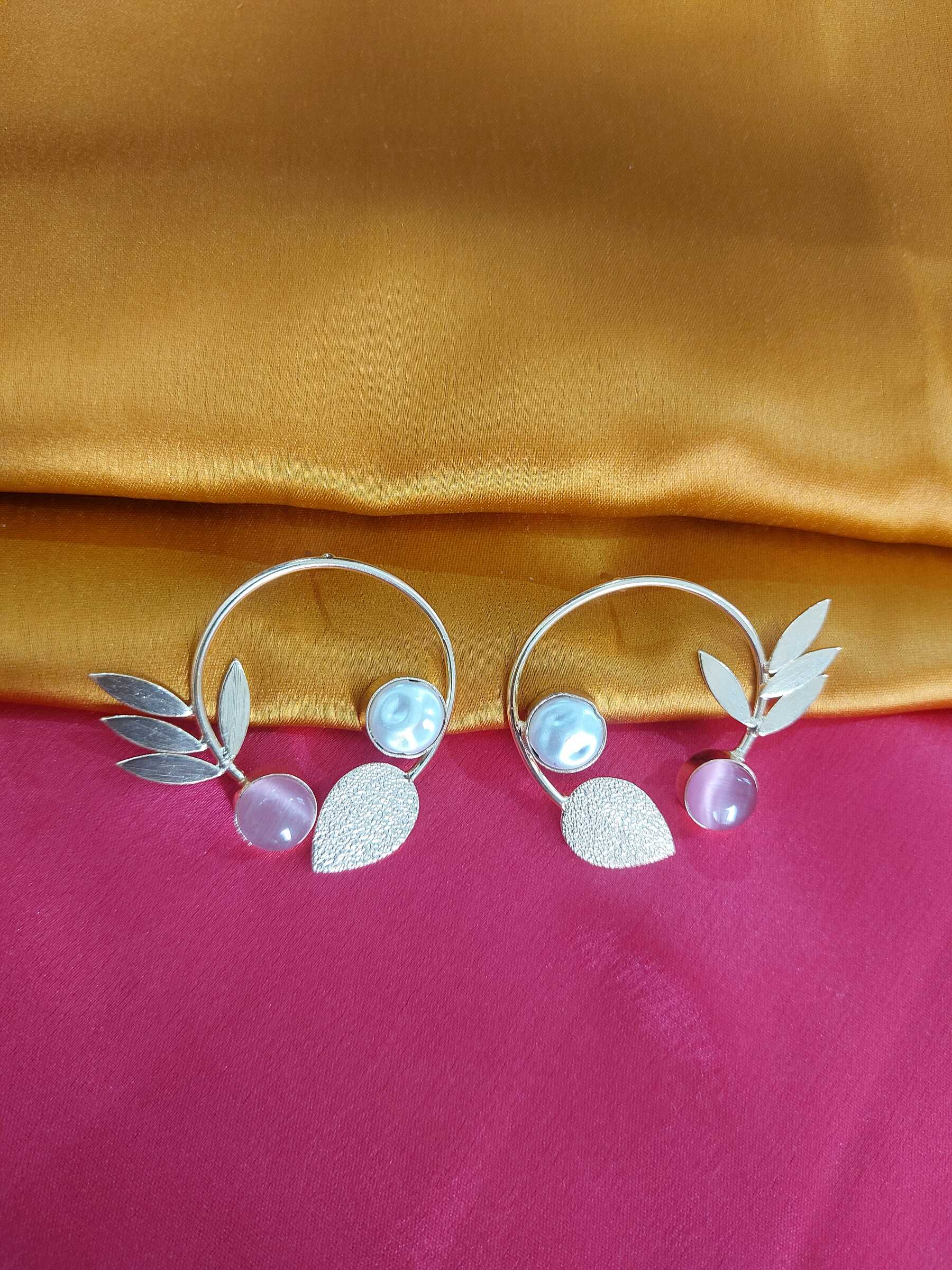 Chhavi  Round Shaped Light Pink Gold Plated Natural White Stone Studded Minimalistic Earrings