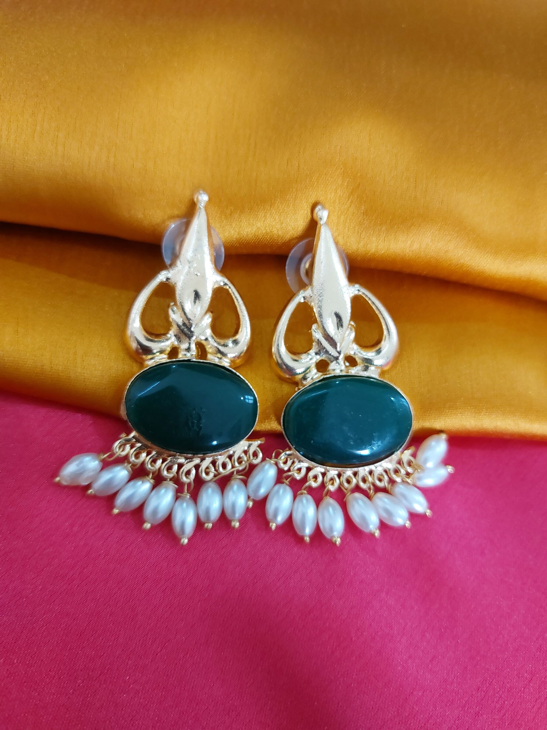 Harshita Green Stone Gold Plated Trishul Shaped Fusion Earrings