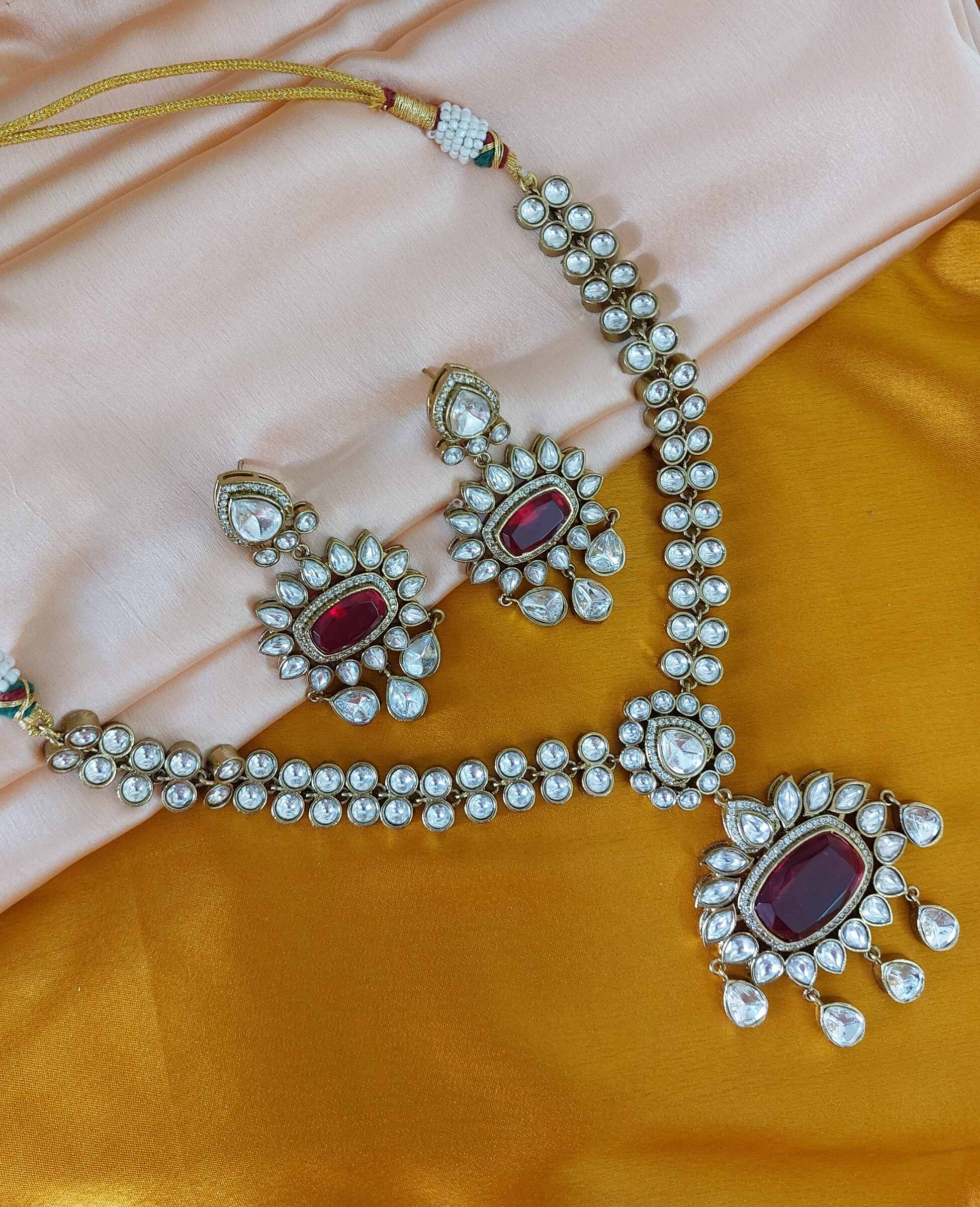 Khushi Semi Bridal Ruby Stone Studded Kundan Embelished  Antique Gold Long Necklace Set With Earrings