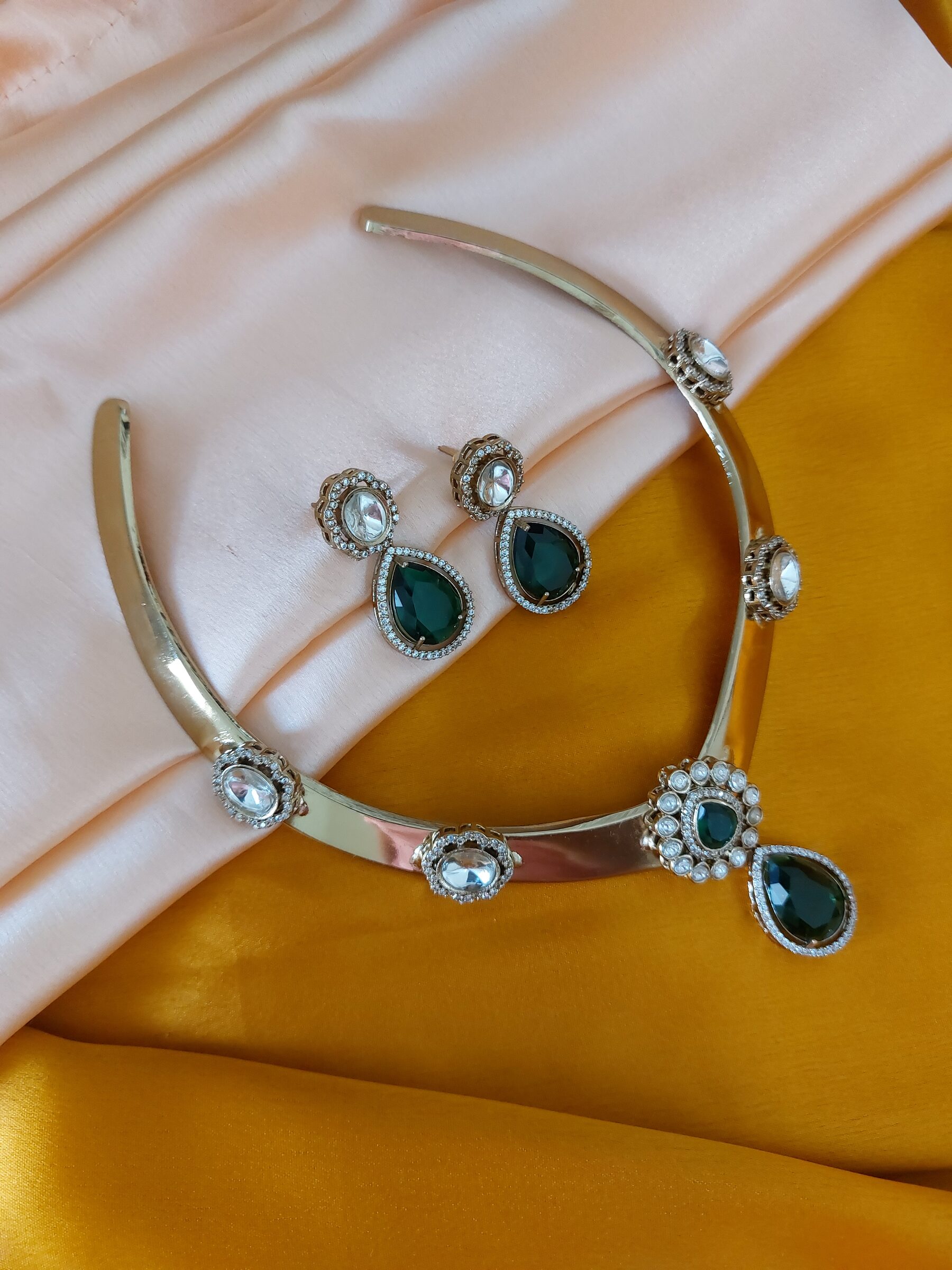 Maya Moissanite Kundan Green Coloured Antique Gold V Shaped Hasli Necklace Set With Earrings