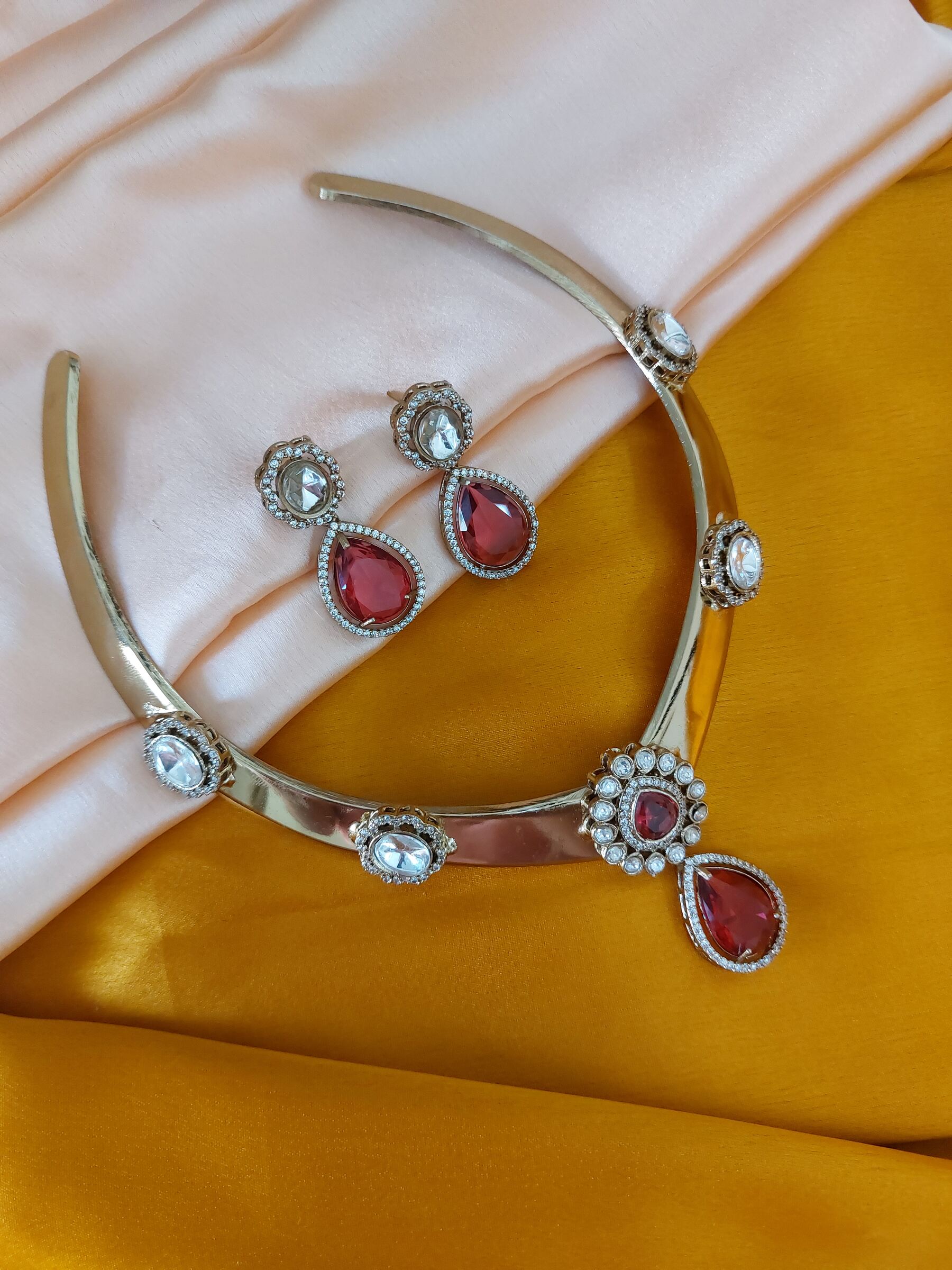 Mehak Moissanite Kundan Ruby Coloured Antique Gold V Shaped Hasli Necklace Set With Earrings