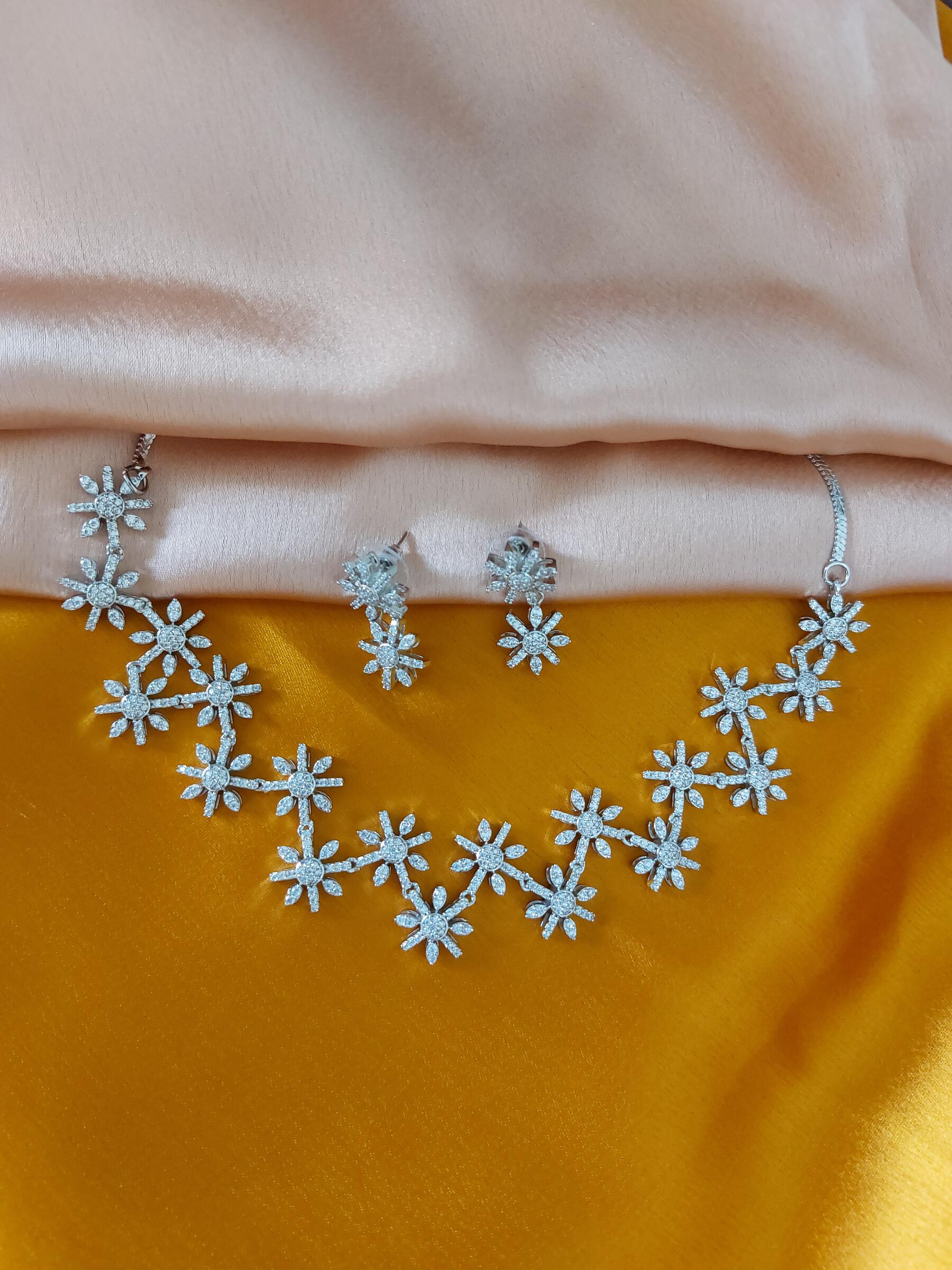 Molly Invincible Chain Flower Shaped Celebrity Looklike American Diamond Necklace Set With Earrings