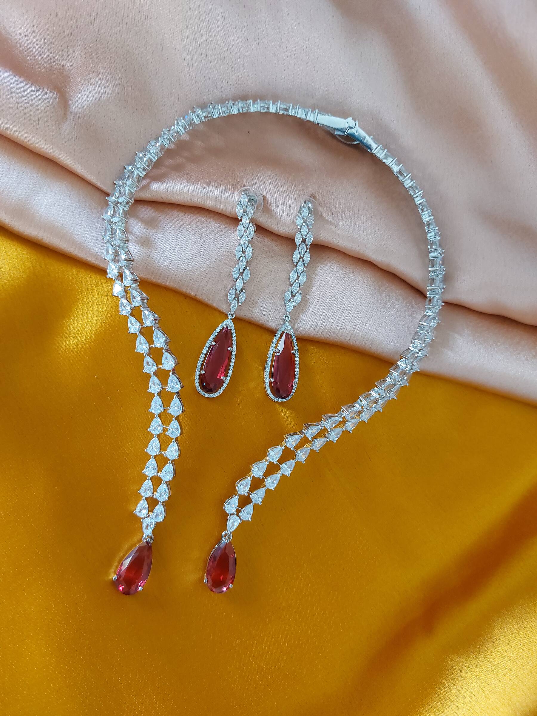 Rebecca Anjali Merchant Inspired Ruby Coloured American Diamond Hasli Necklace Set With Earrings