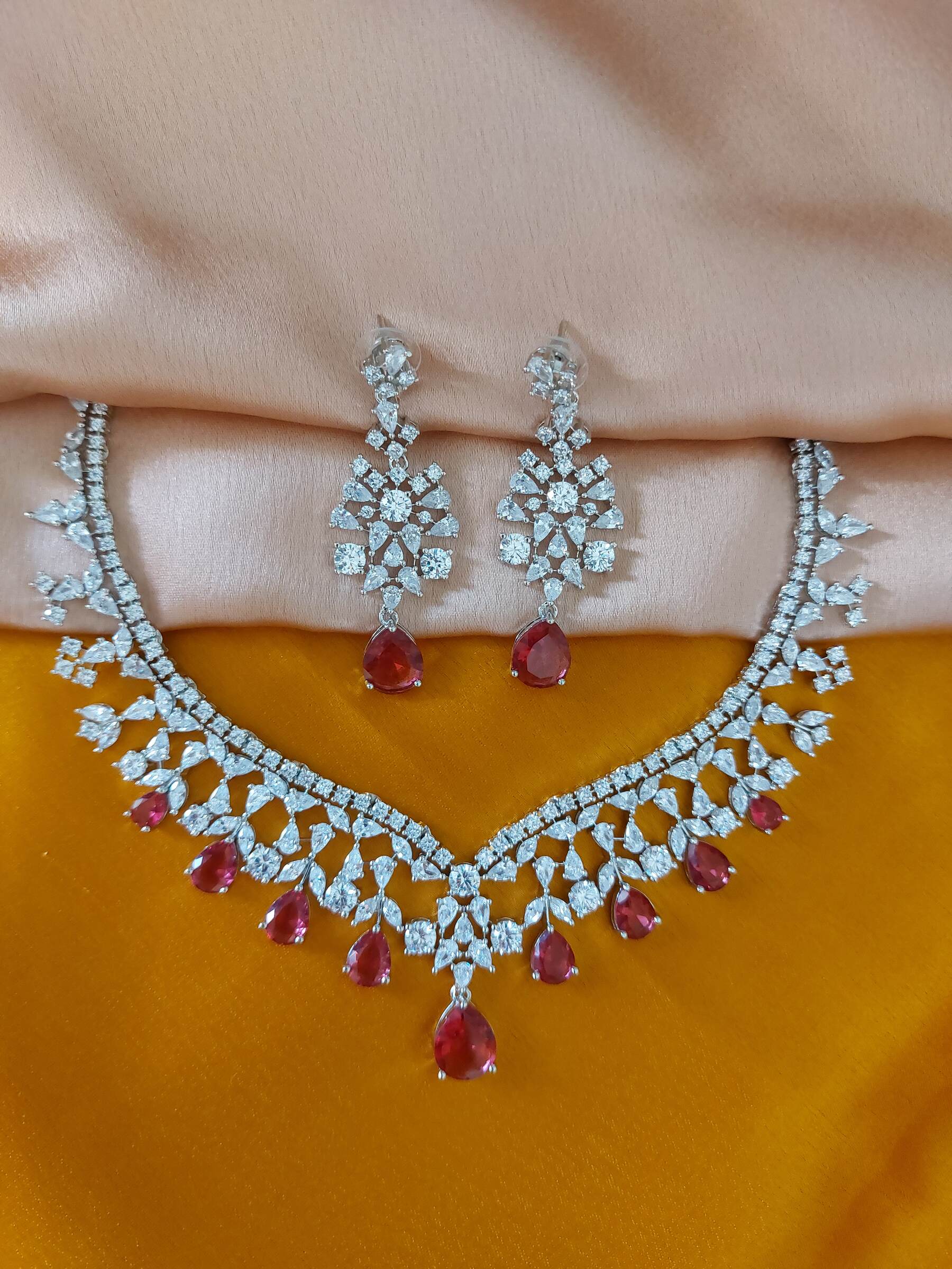 Symphony Ruby Coloured American Diamond Necklace Set With Earrings