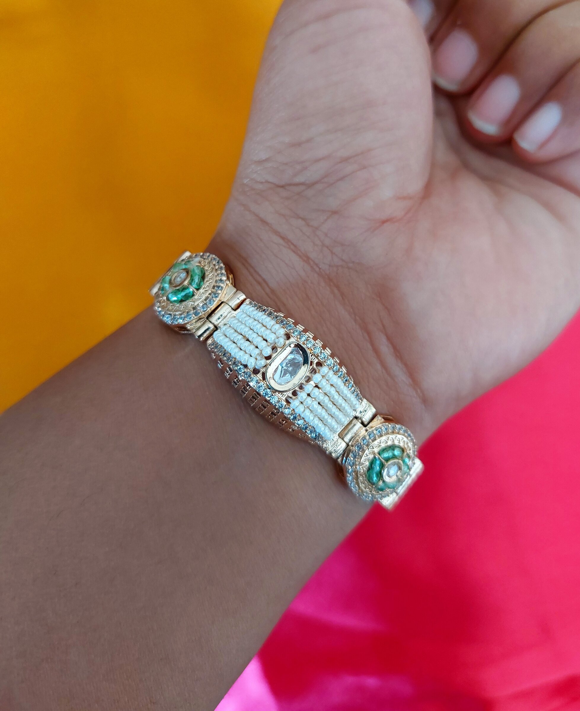 Somya Gold Plated Green Moti Studded Kundan Fusion Wear Bracelet